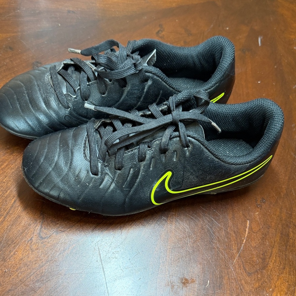 Nike Black Soccer Cleats with Yellow Accents